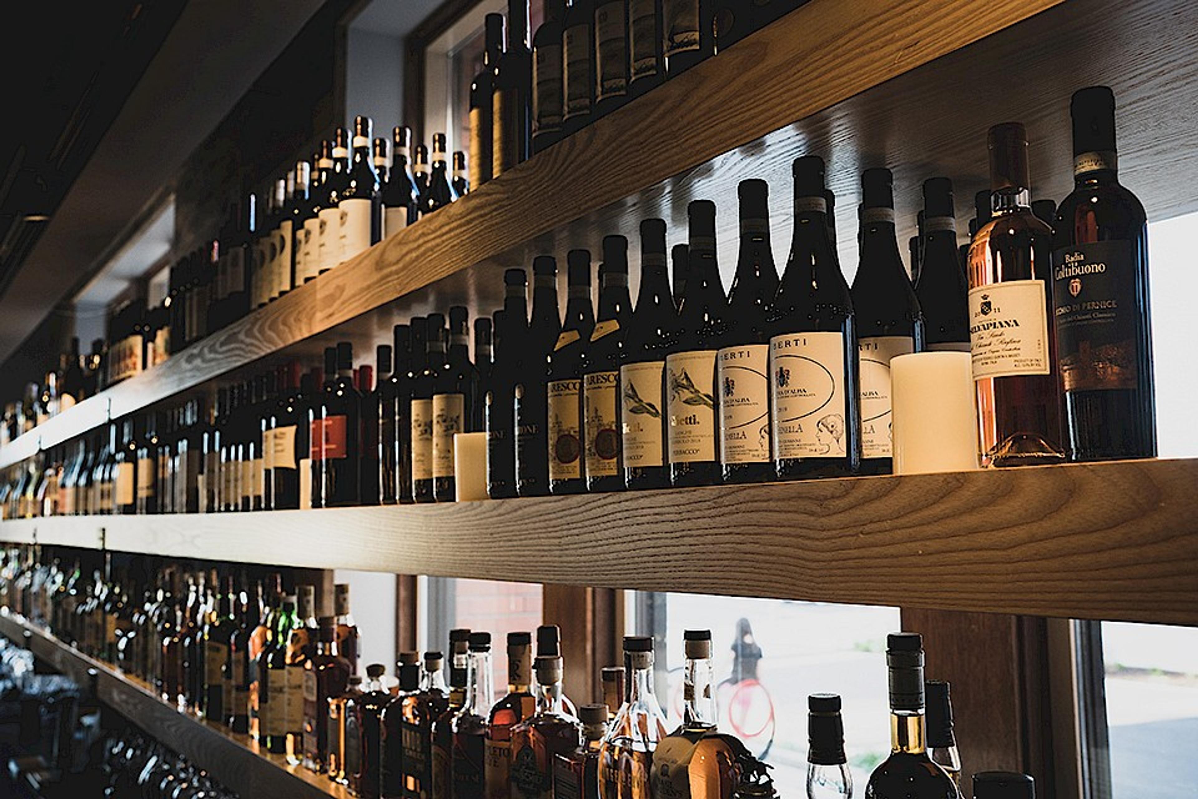 Wine bottles adorning the restaurant's shelves
