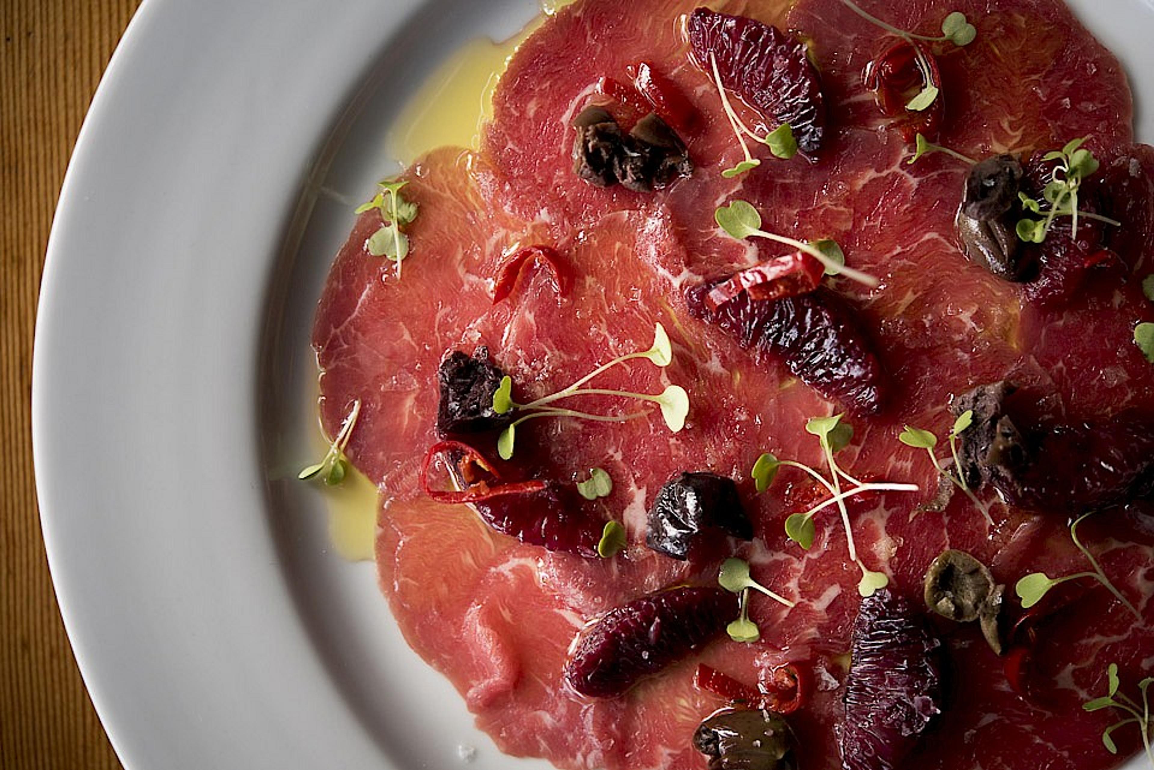 Beef carpaccio with blood orange, Serrano chili