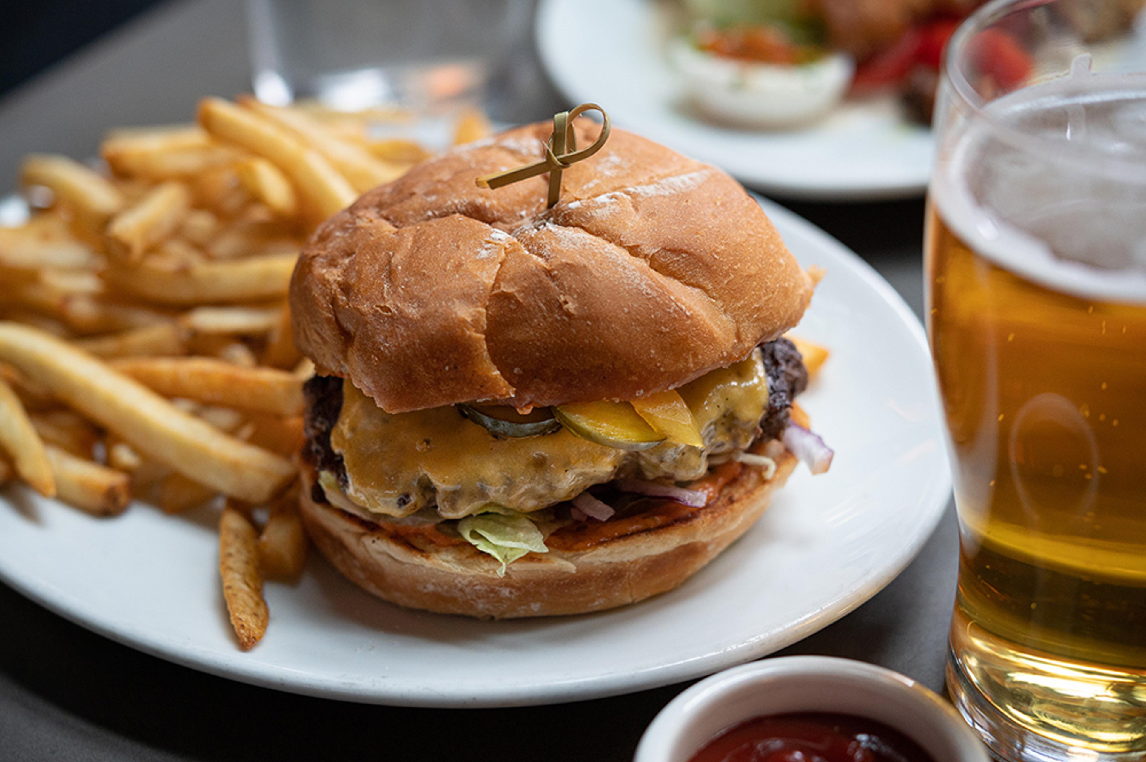 Victory Burger with fries and a cold beer