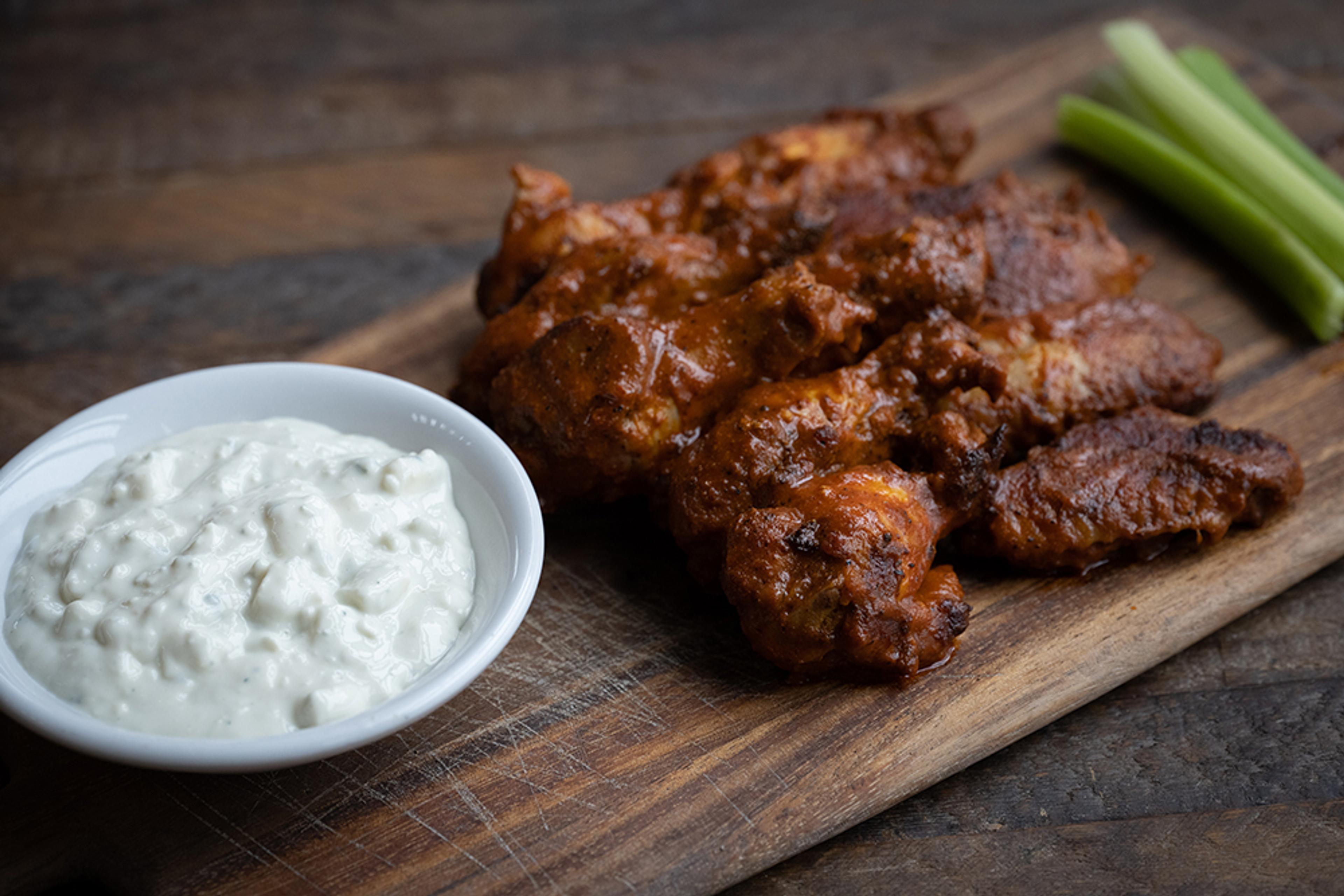 Spicy chicken wings with blue cheese and celery
