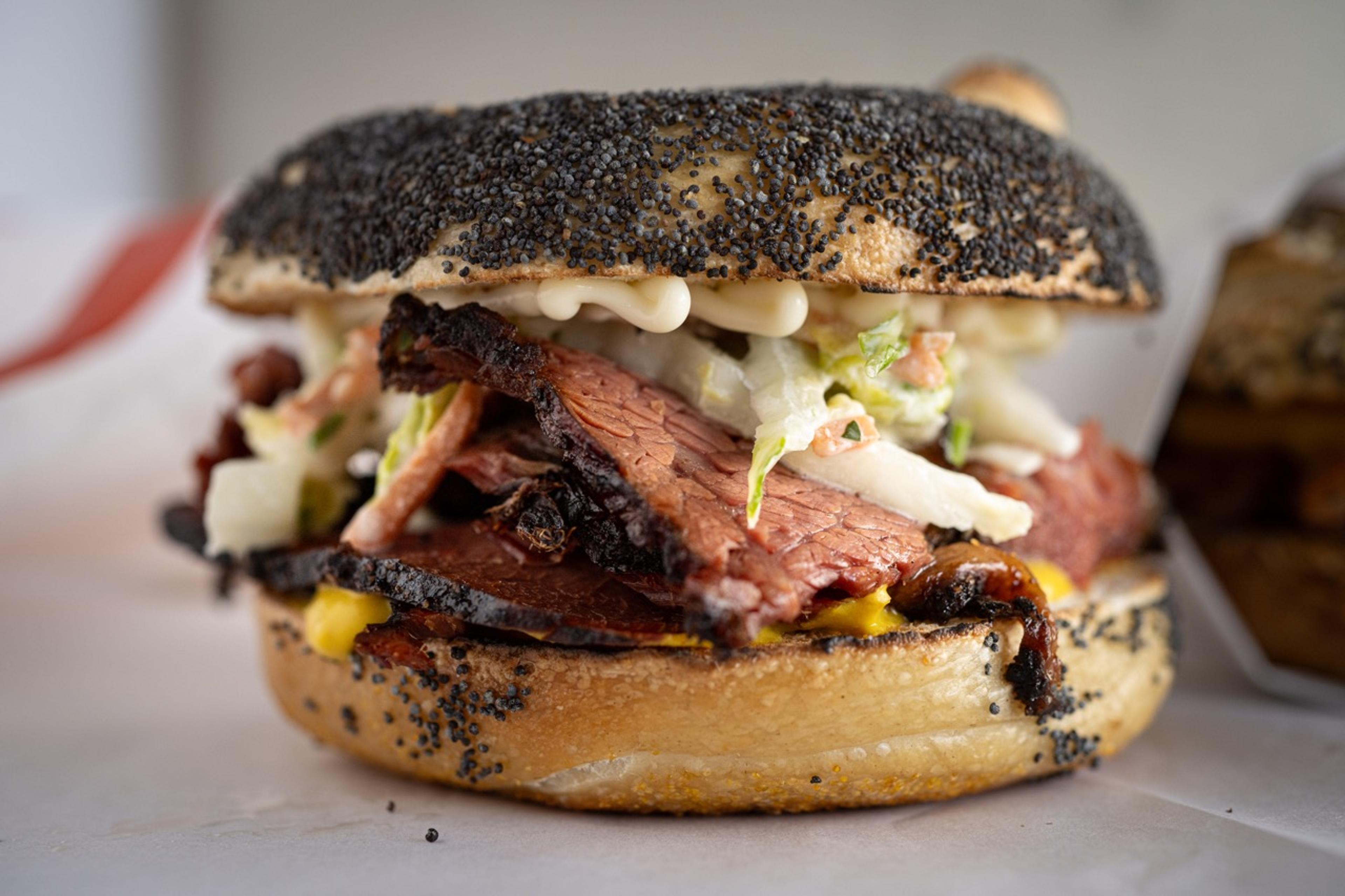 pastrami on a poppy seed bagel