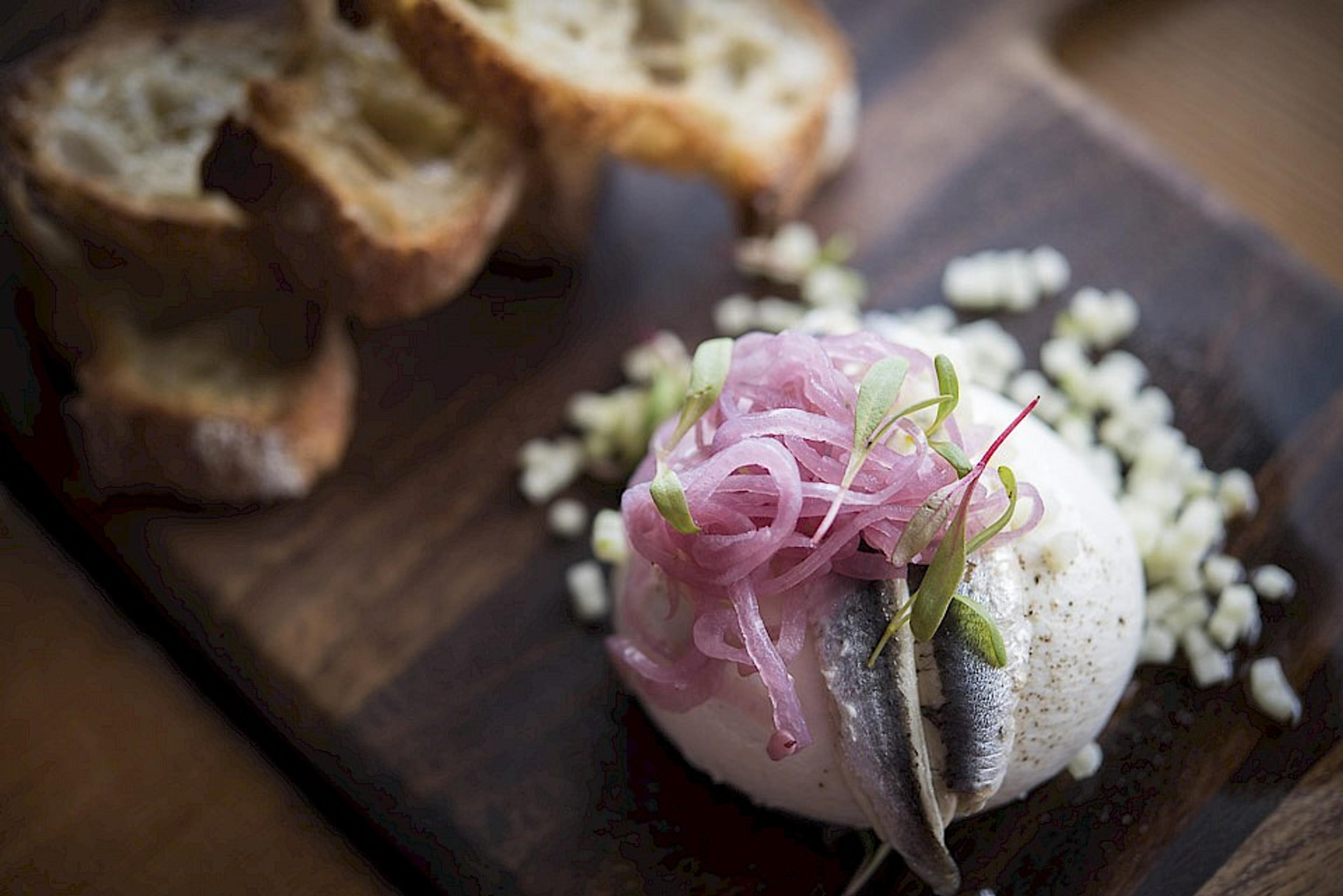 Burrata with pickled white anchovies, pickled onion, apple