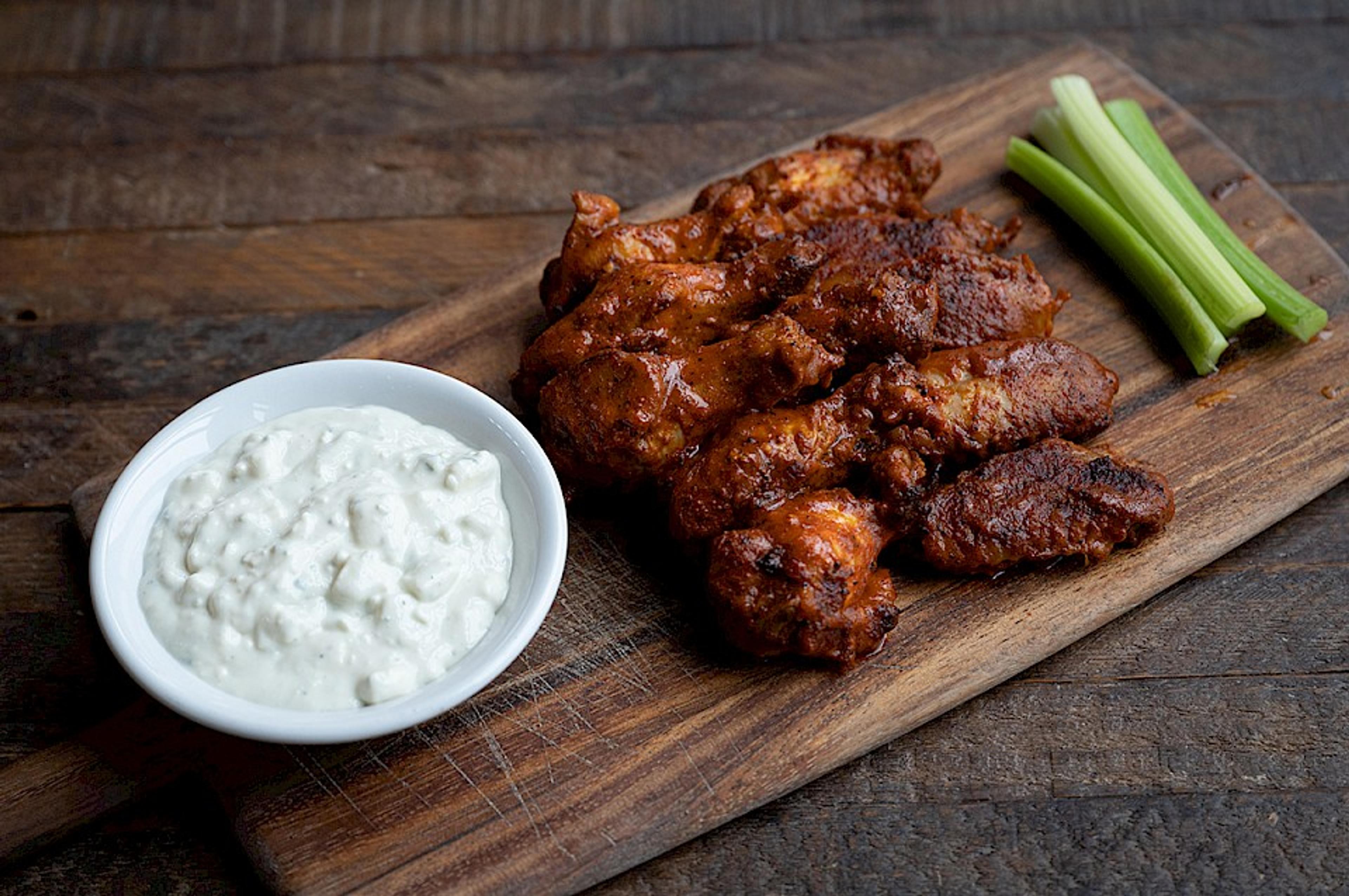 Spicy chicken wings with blue cheese and celery