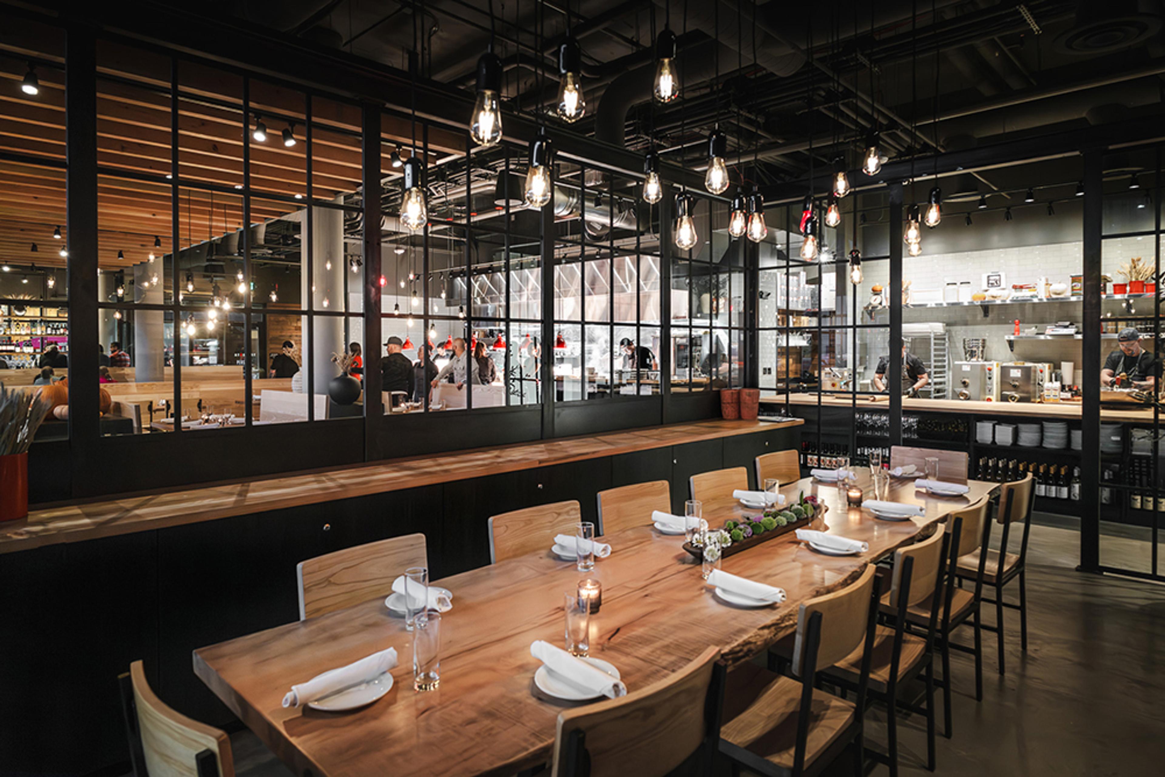 private dining room with Edison bulb lights hanging from ceiling