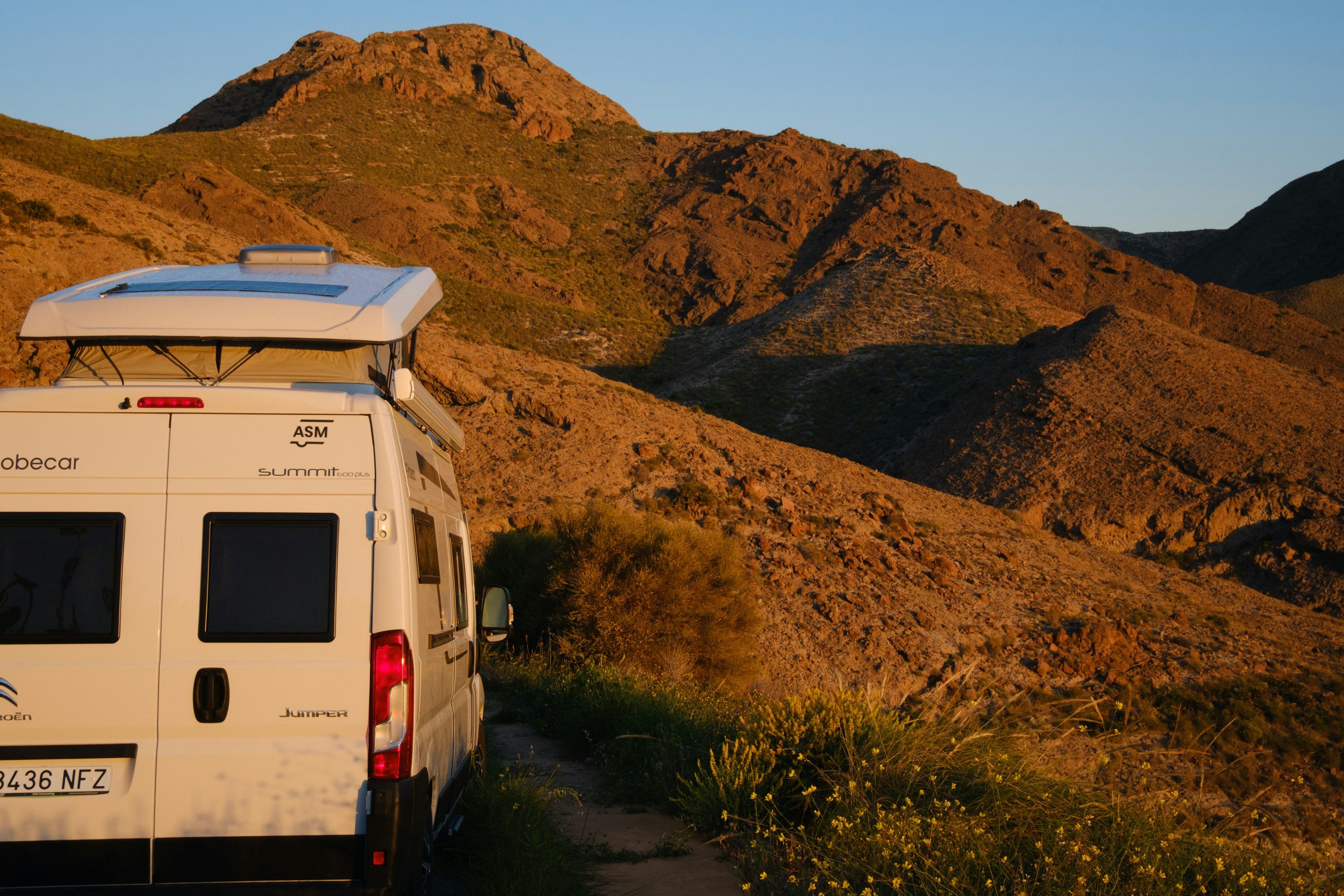A rooftop-tent trip through a warm landscape