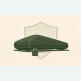 Olive-green hardshell rooftop tent on crossbars, locked with a padlock