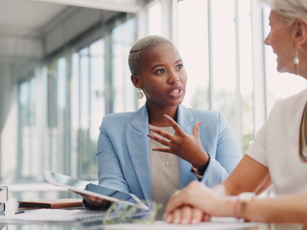 A client and professional reviewing information together
