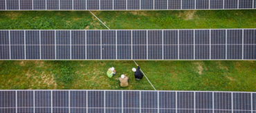 Solar panels with workers