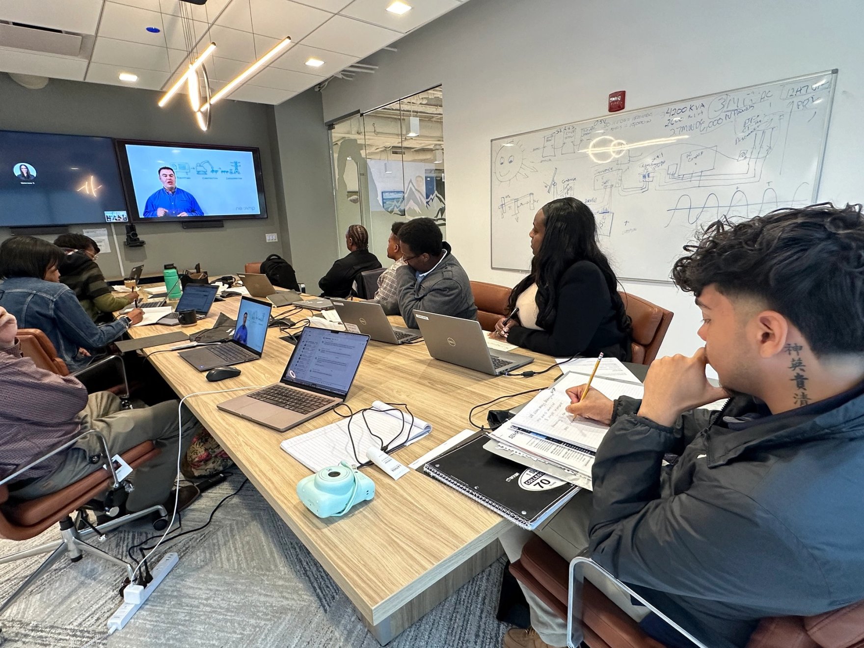 Nexamp fellowship program participants learn about career opportunities in renewable energy.