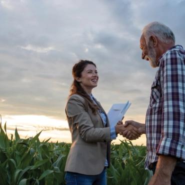 Man and woman shaking hands