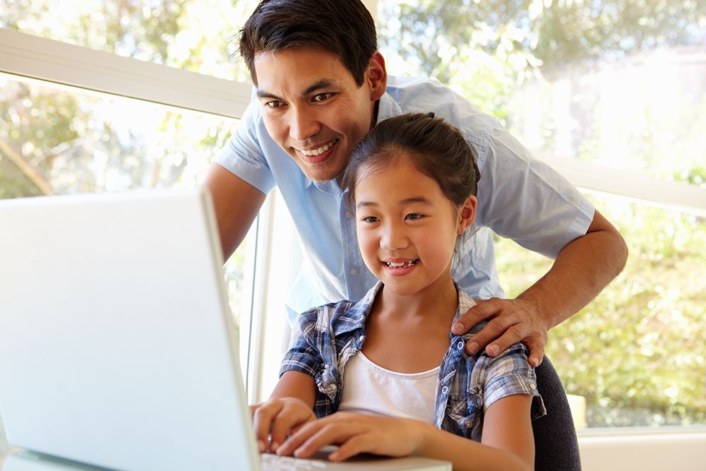 Father daughter laptop