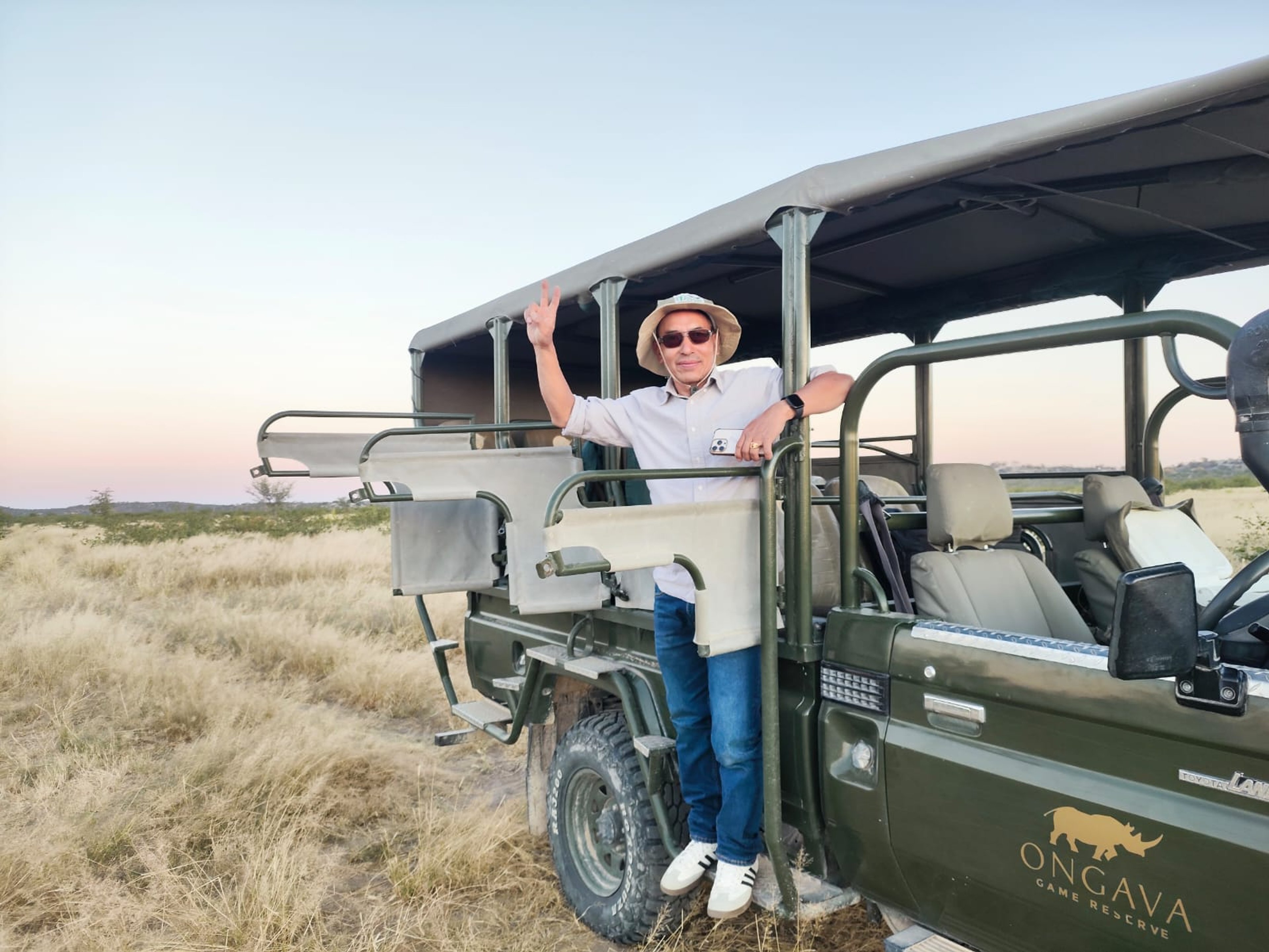 Experiencing wildlife up close— One of the Nepali conservation partners on a morning drive at Ongava Game Reserve.
