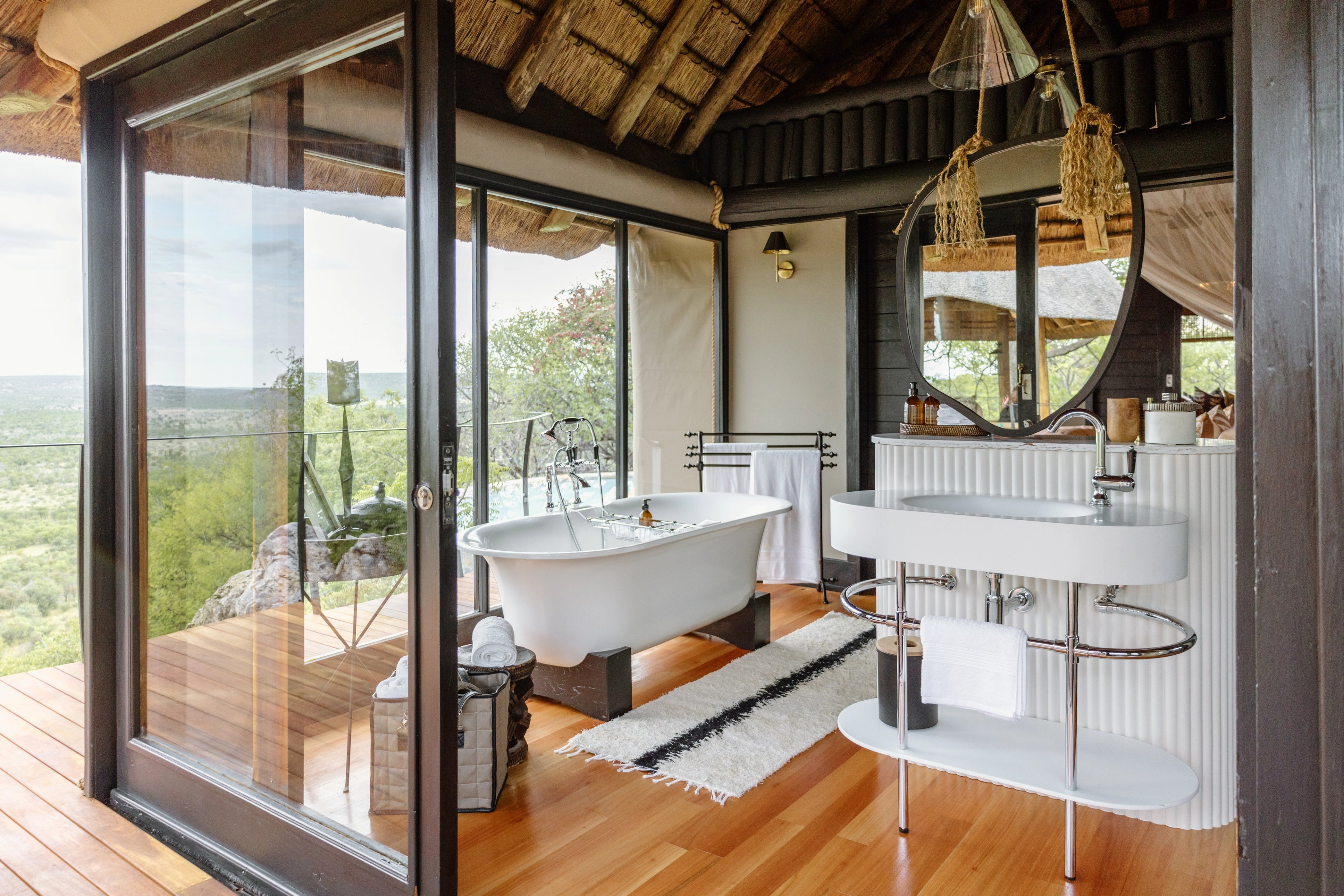 A private bathing space where natural textures and soft light create a sense of calm refinement.
