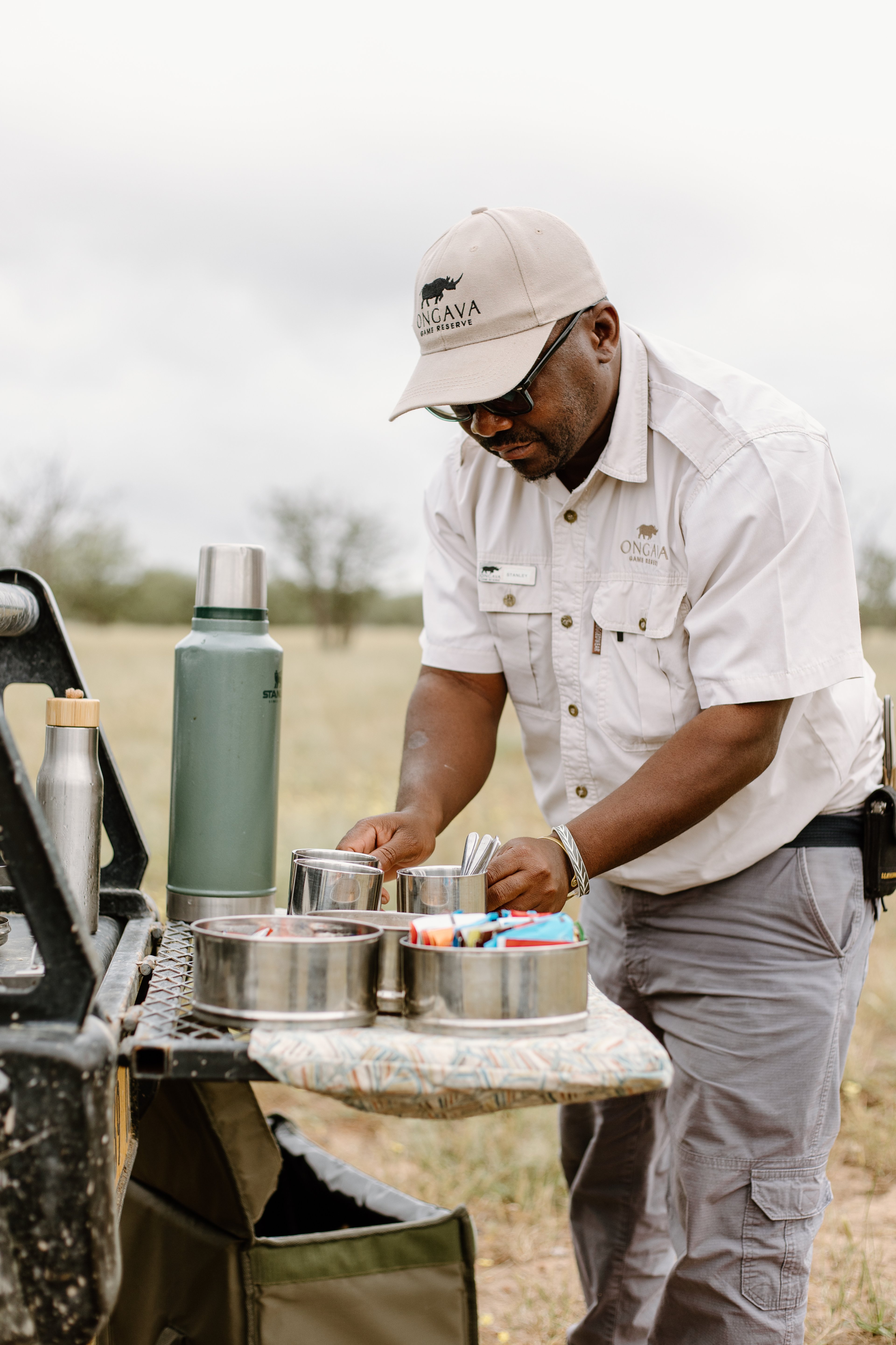 A welcome pause — Stanley prepares morning tea and snacks in the heart of the wilderness.