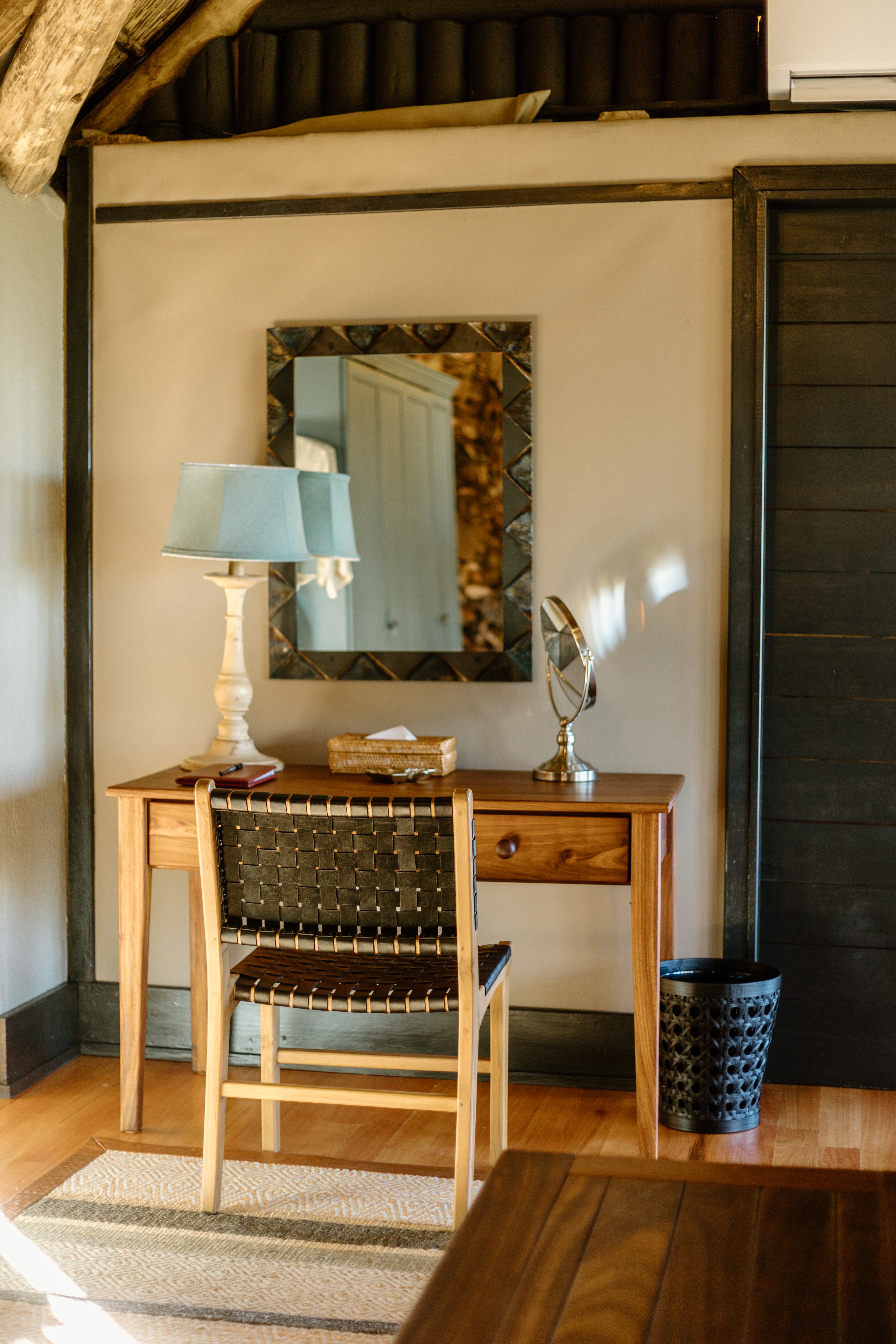 A quiet workspace designed for focus, framed by uninterrupted views of the wild.