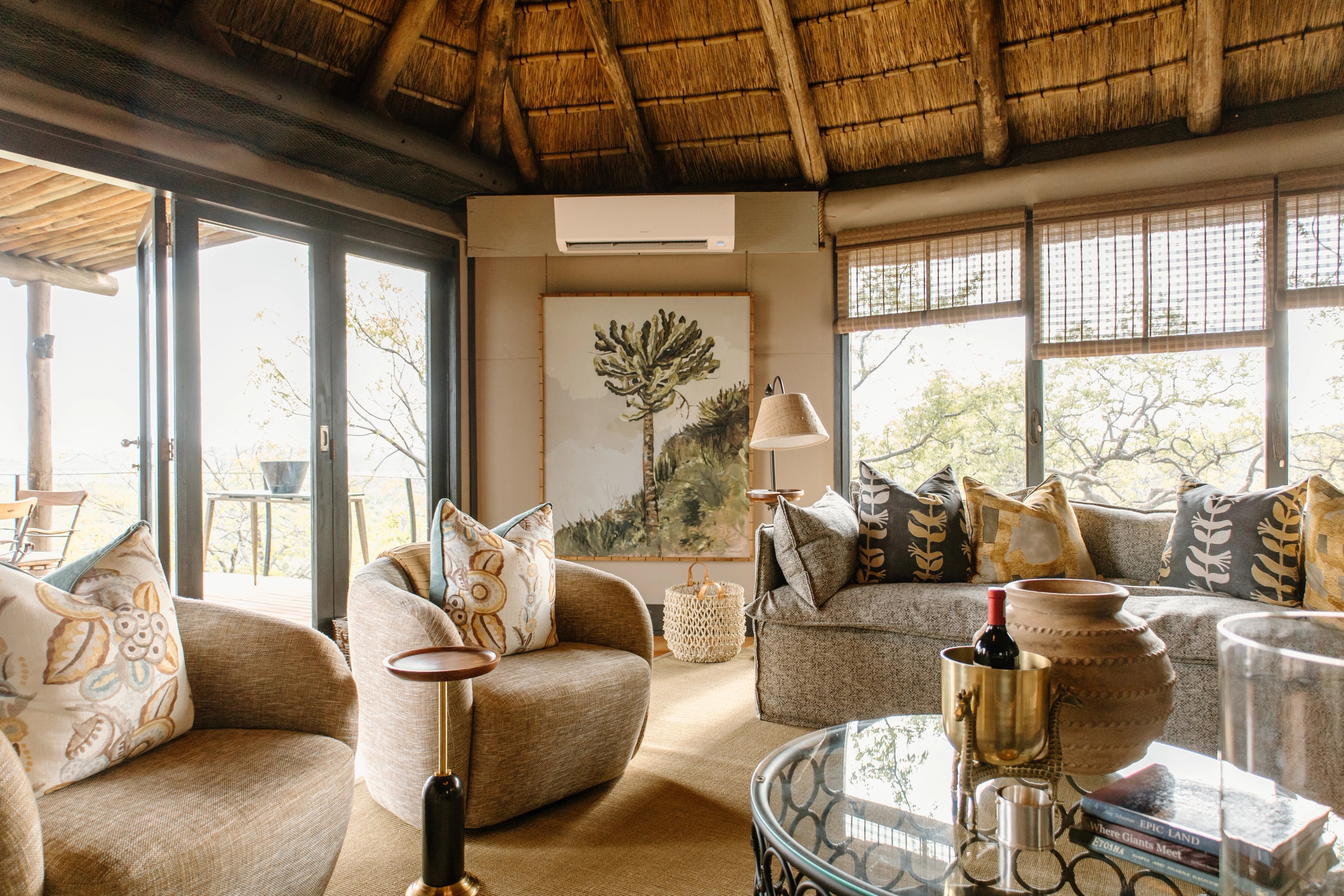 An open living space where comfort and calm are shaped by the surrounding wilderness.