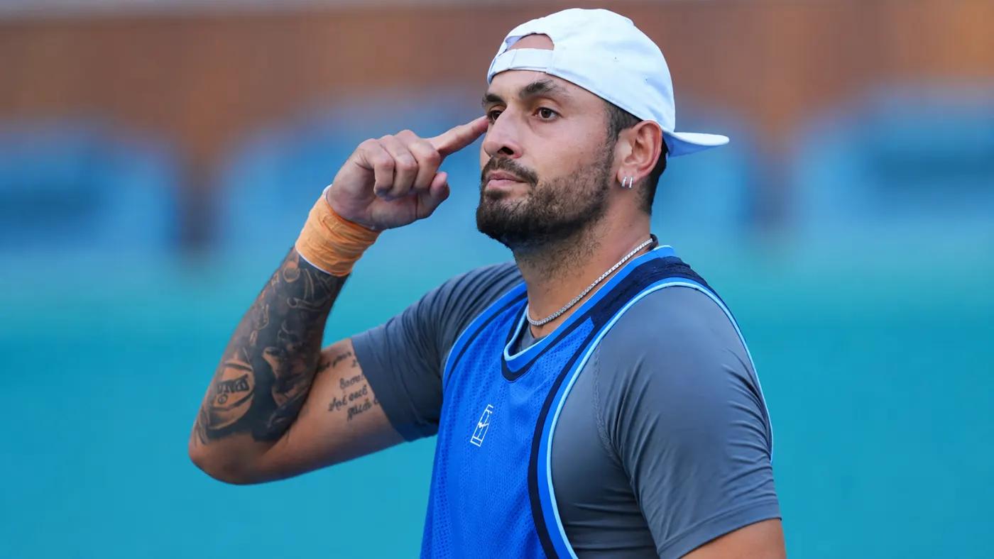 Kyrgios pointing to his head