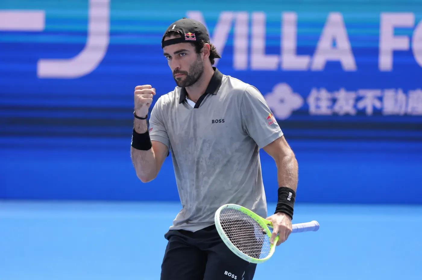 Matteo Berrettini pumps his fist after a point
