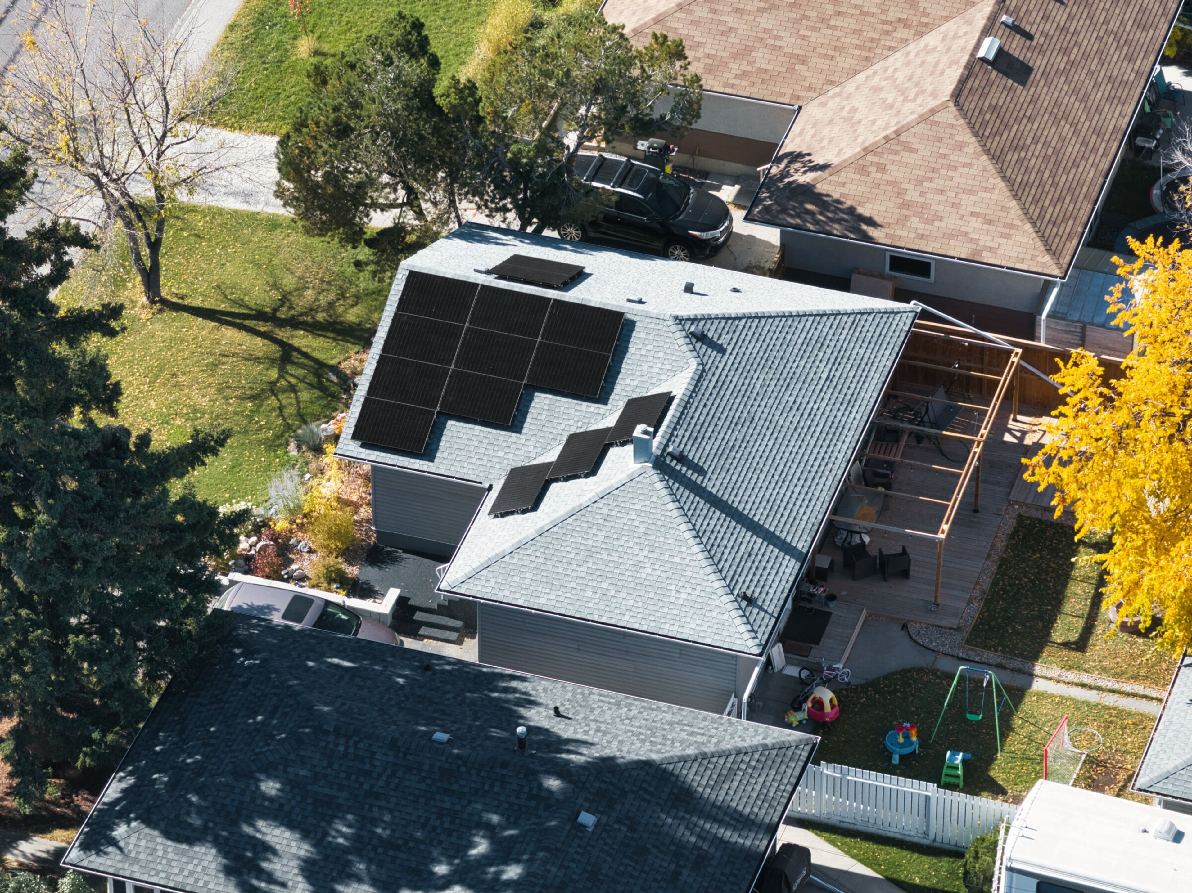 Aerial view of Calgary home with Firefly Solar 7 kW rooftop solar panel system