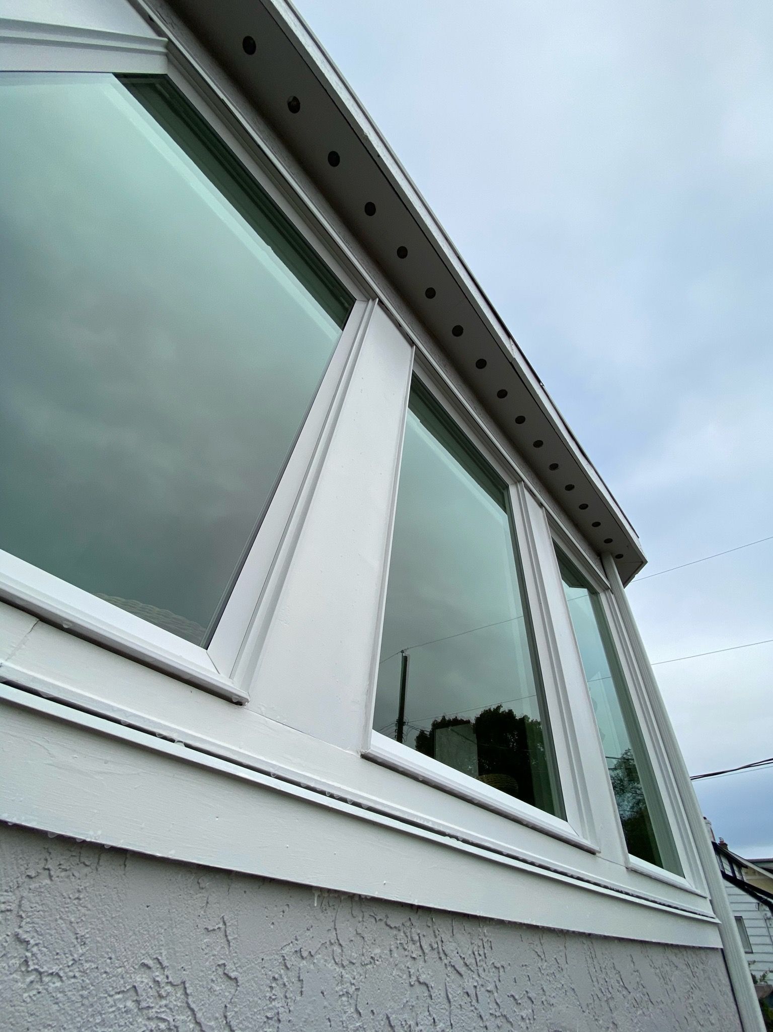 Crystal clear exterior windows after professional cleaning by Winning Window Cleaning on a Victoria BC home