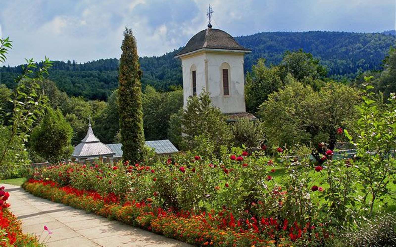 A church and rose garden in Izvoarele, Prahova