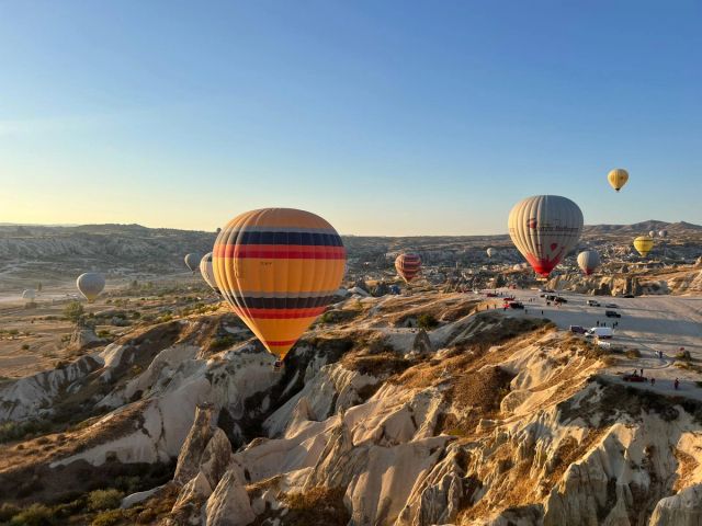 Hot air balloons over the rock formations of Cappadocia