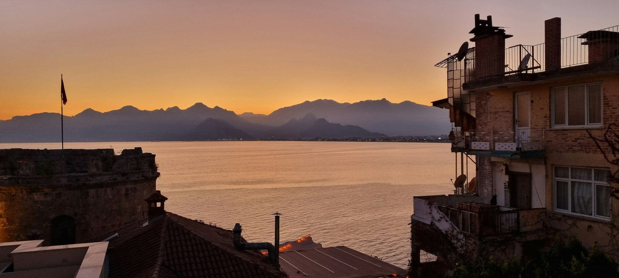 Sunset over the Bay of Antalya and distant mountains