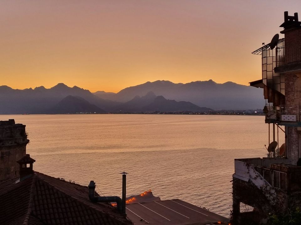 Sunset over the Bay of Antalya and distant mountains