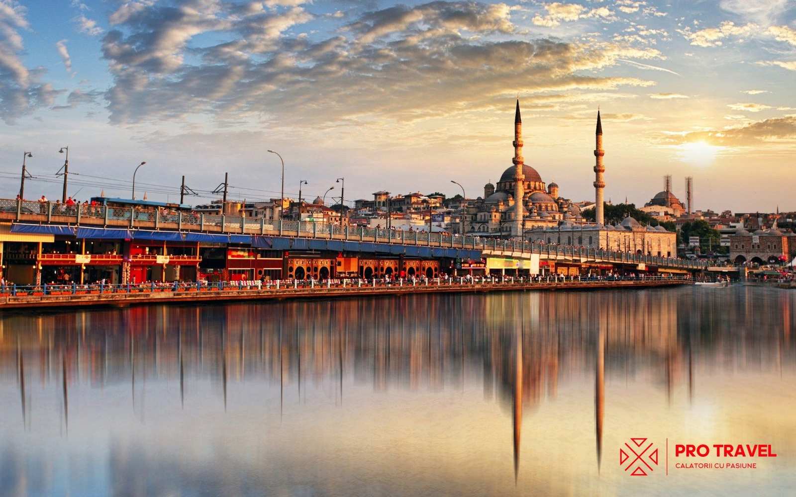 The Galata Bridge and the New Mosque in Istanbul at sunset