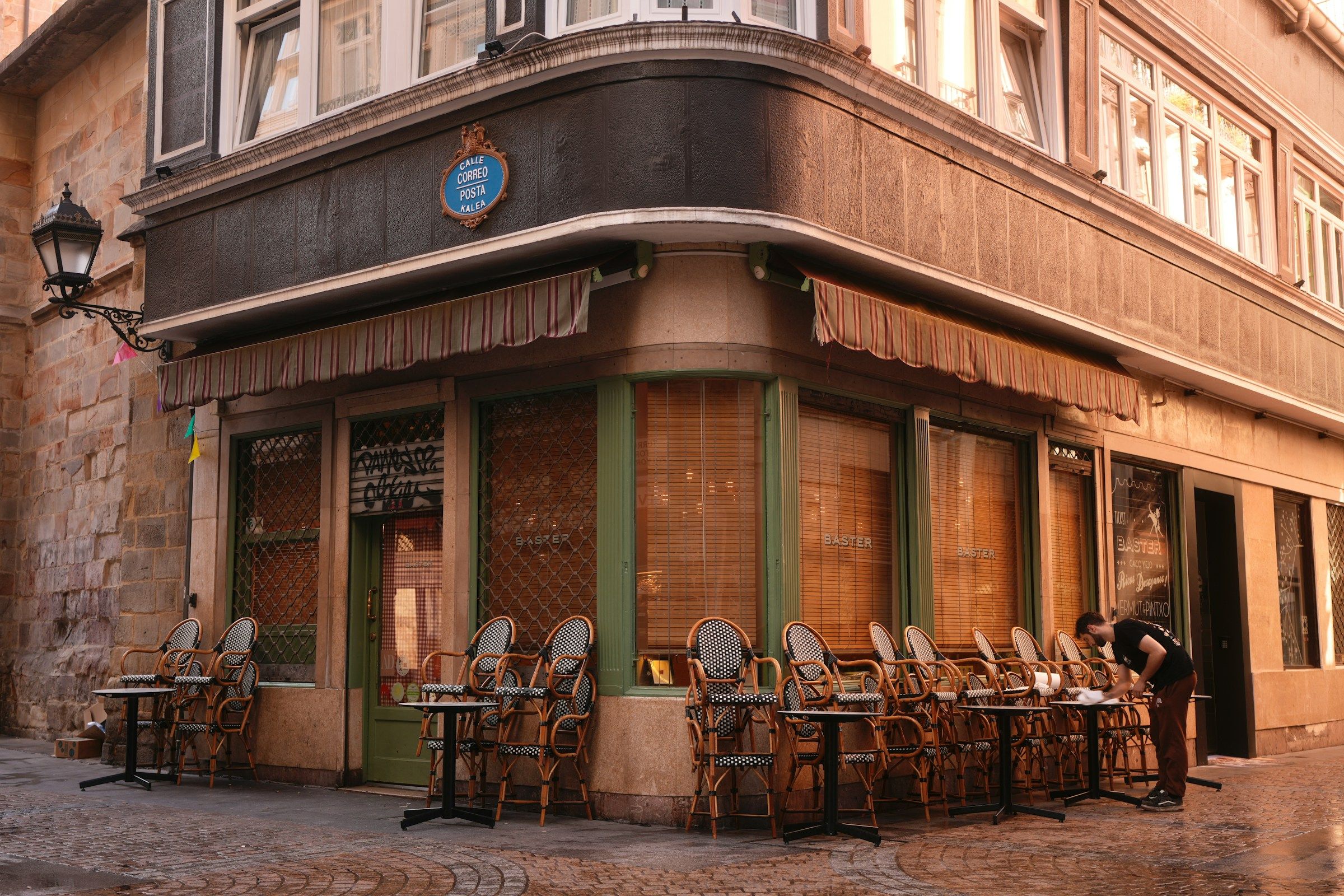 A café terrace in front of a historic building