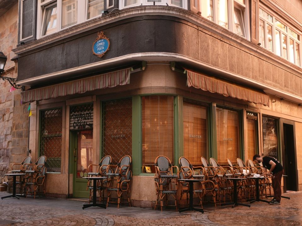 A café terrace in front of a historic building