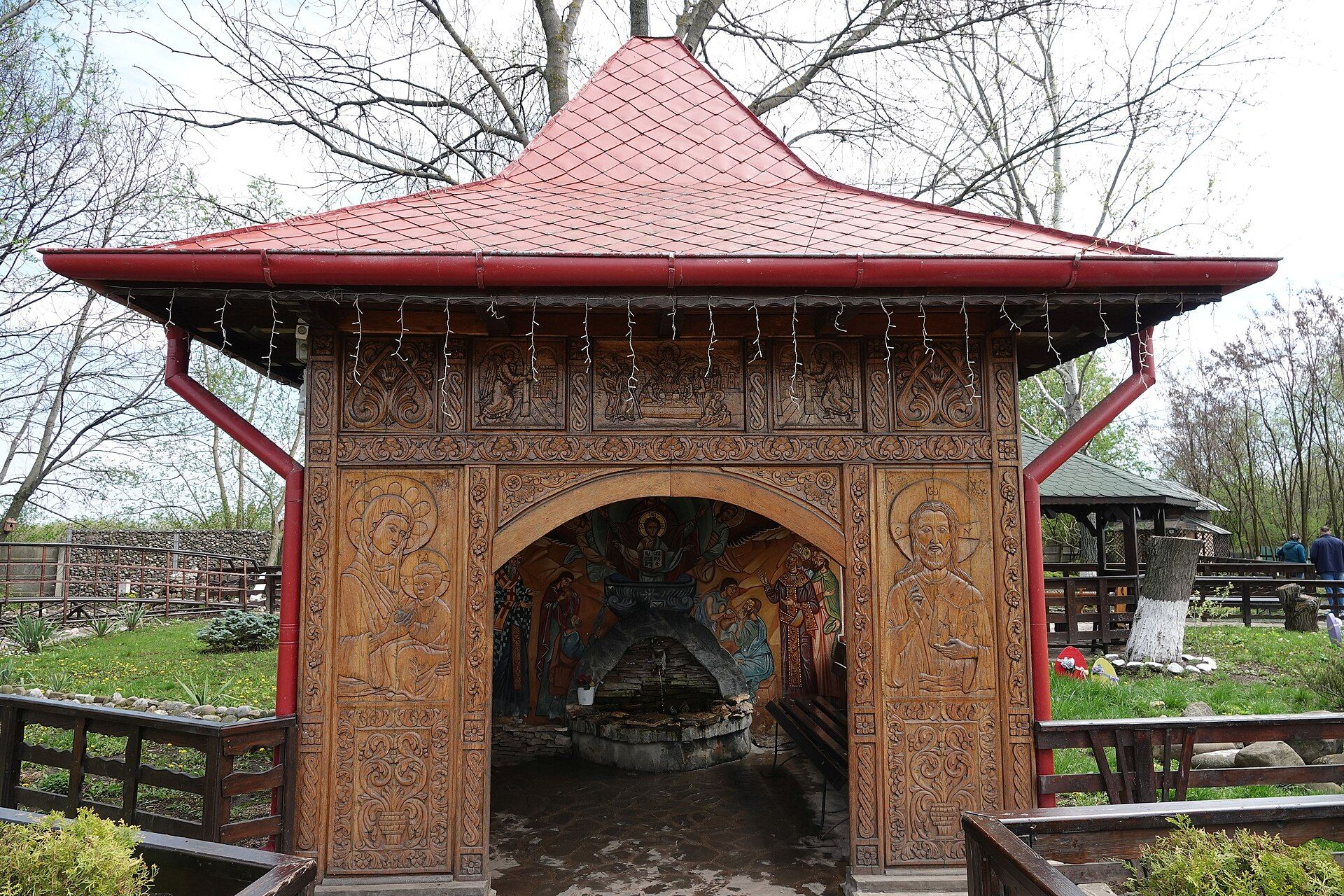 A carved wooden shrine in the Ghighiu Monastery courtyard