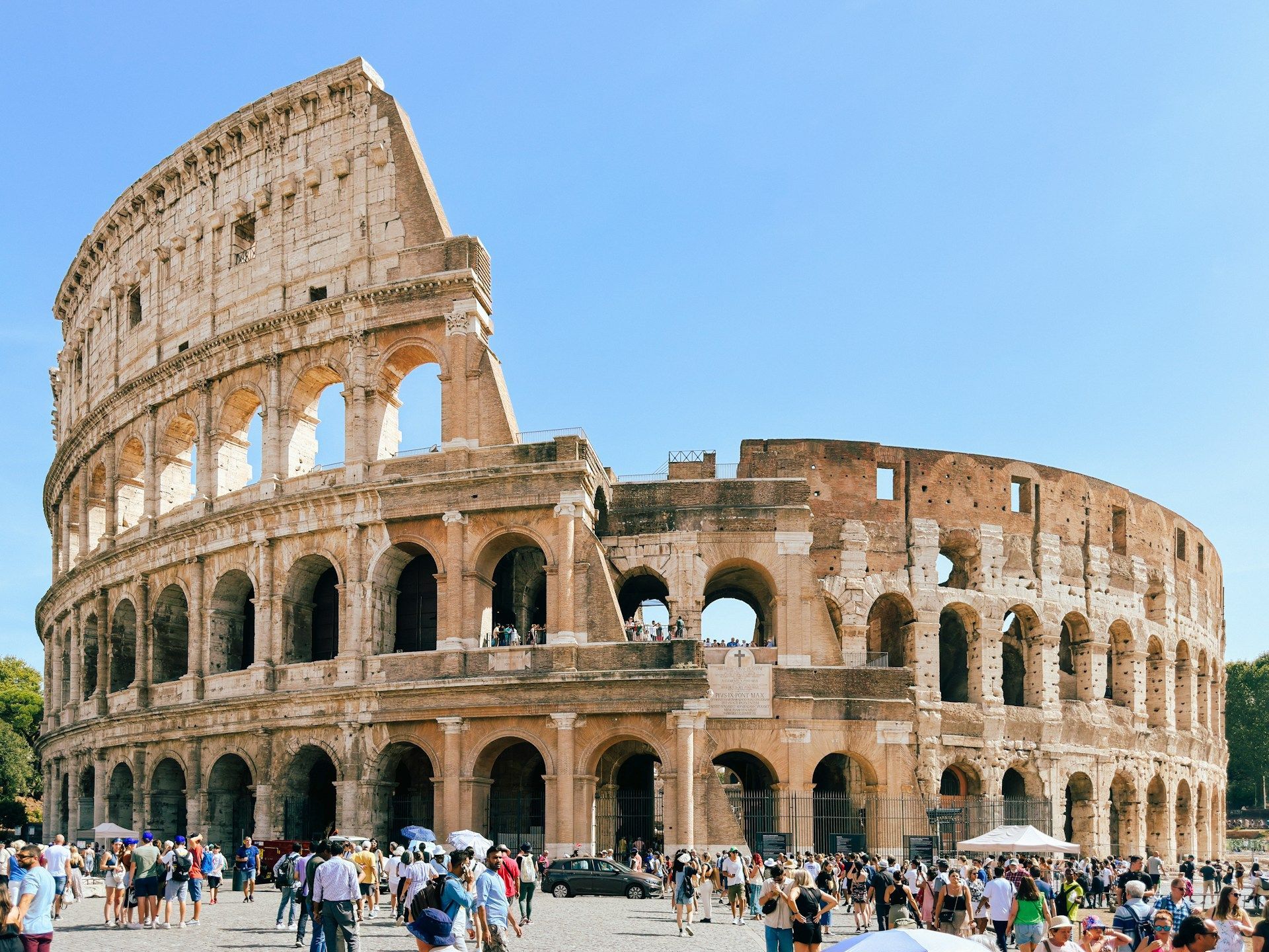 The Colosseum in Rome, with visitors at the entrance