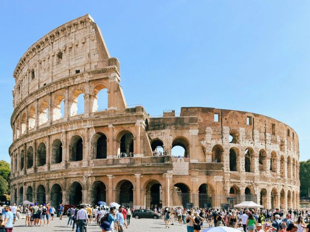 The Colosseum in Rome, with visitors at the entrance