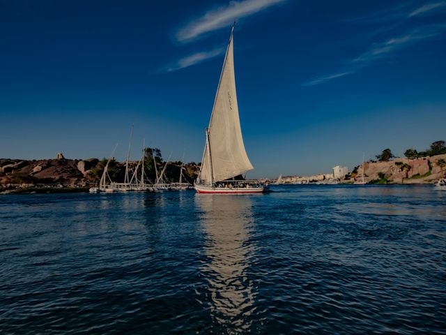 A felucca on the Nile at Luxor under a clear sky