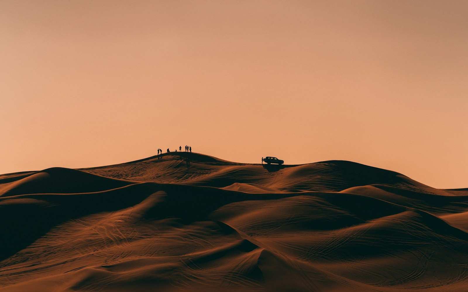 Desert dunes at sunset