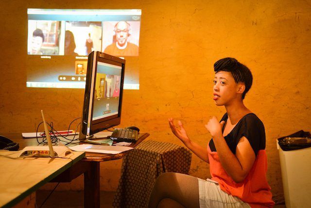 Conversations at Morija #1, 2013. Lerato Bereng, curator, in a Skype conversation with Kojo Baffoe, poet, writer and then-editor of Destiny Man magazine. Photo: Zachary Rosen, Ba Re e Ne Re Literature Festival