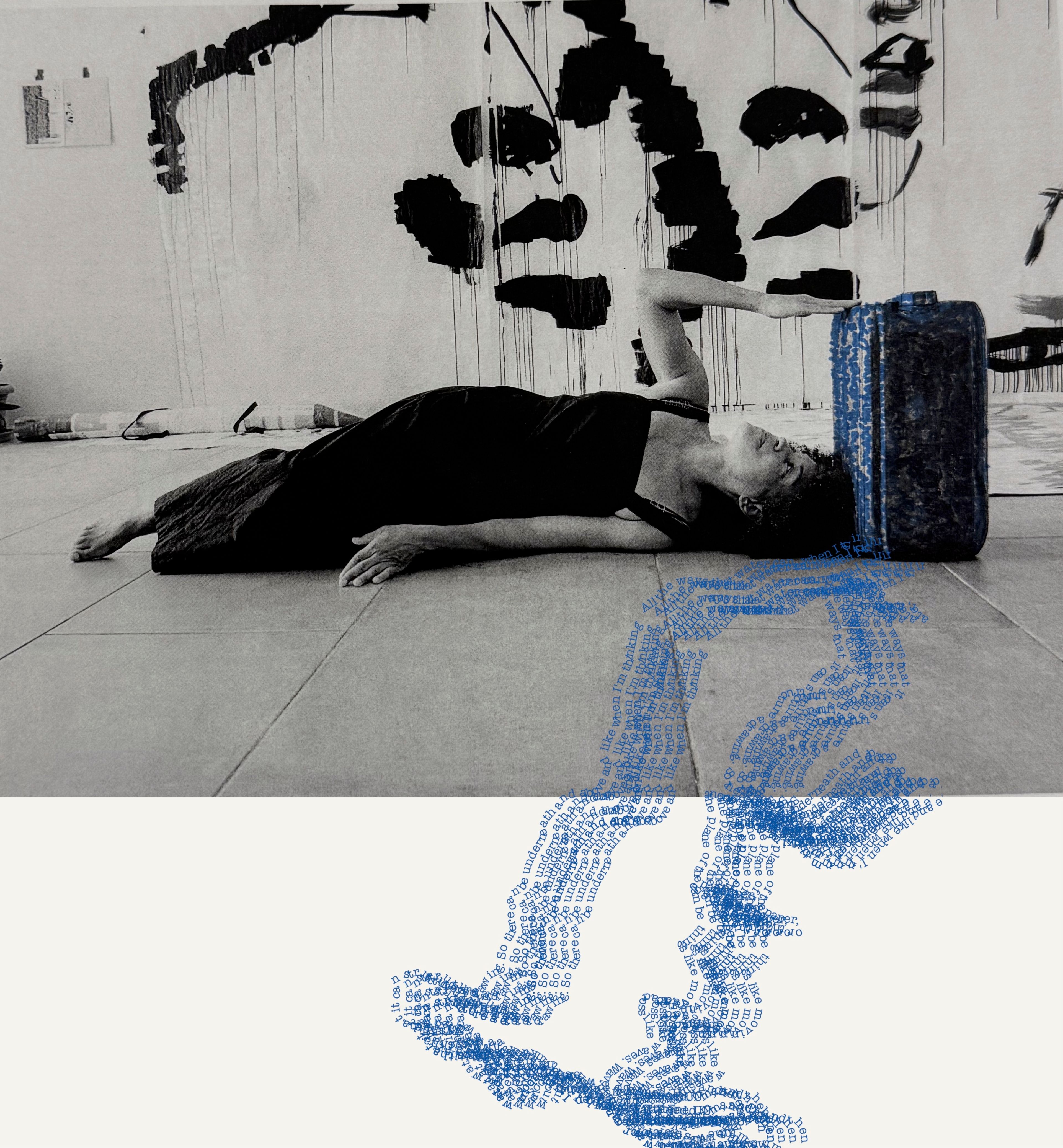 A woman lies on a floor with her arm on a blue suitcase, as blue digital patterns flow below. Abstract black art adorns the wall.