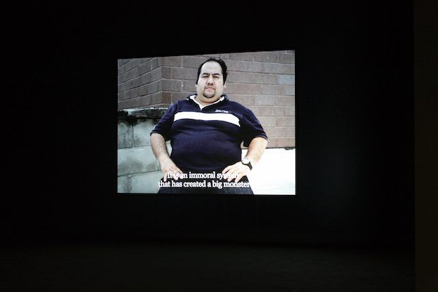 Bouchra Khalili Speeches-Chapter 3: Living Labour 2013 Digital film, 25' From The Speeches Series, a video trilogy. View of the installation at Living Labour, solo exhibition, PAMM, Miami, 2013. Courtesy of the artist and Galerie Polaris, Paris and the Marrakech Biennale