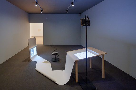 Vanishing Point, 2013 Two birch wood structures, paper and two Super 8 films transferred to HD video Installation view 8th Berlin Biennale, 2014