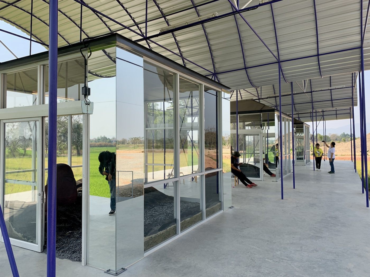 (Inside the cubes) Precious Okoyomon, A Blue Instant, a Forward Looking sky, 2023. Okoyomon created an installation to present a long-form experiential portrait of ash as a material, a process, and a force. Photo: C&