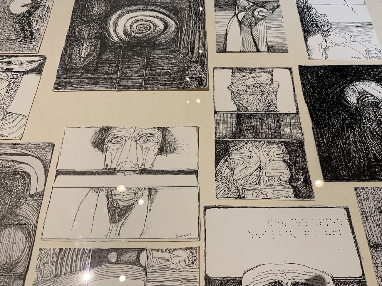 Ibrahim El-Salahi, Behind the Mask, 2020-2021. 99 Drawings. Installation View of “The Milk of Dreams” at Arsenale. Photo: C&amp;