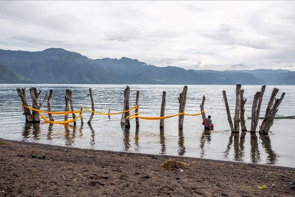 In front of the lake