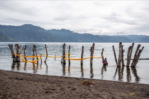 In front of the lake