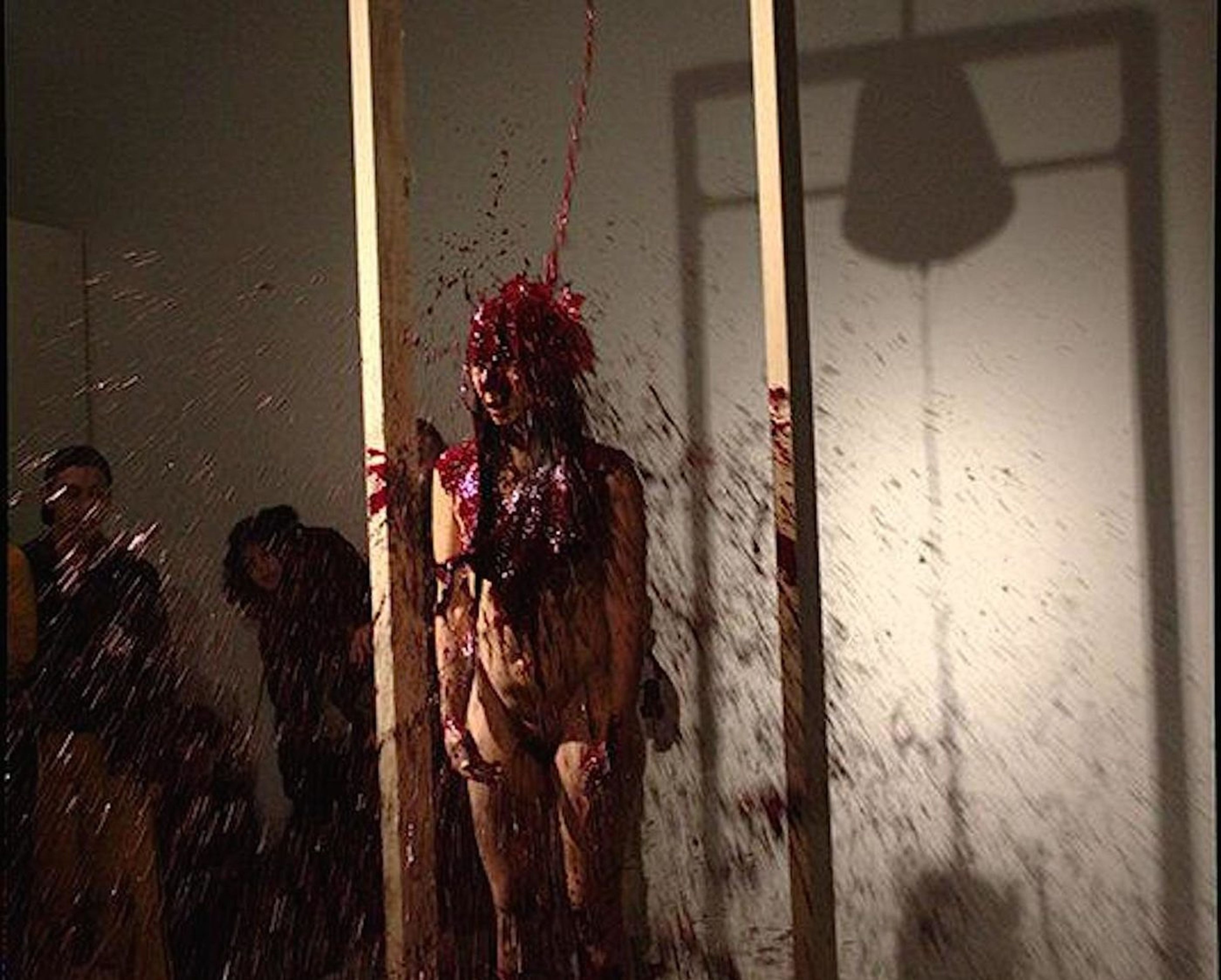 Regina José Galindo, Pig’s Blood, 2017. Performance, Defibrillator Chicago, United States. Photo: Andrei Venghia. Courtesy of the artist.