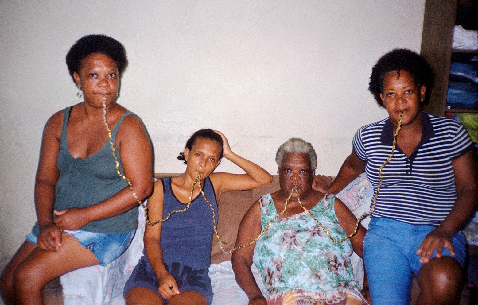 Tadáskía, Corda dourada (Golden line), with my mother Elenice Guarani, my aunt Marilúcia Moraes, my grandmother Maria da Graça and my aunt Gracilene Guarani, 2020. 35 mm photograph. Courtesy of the artist.