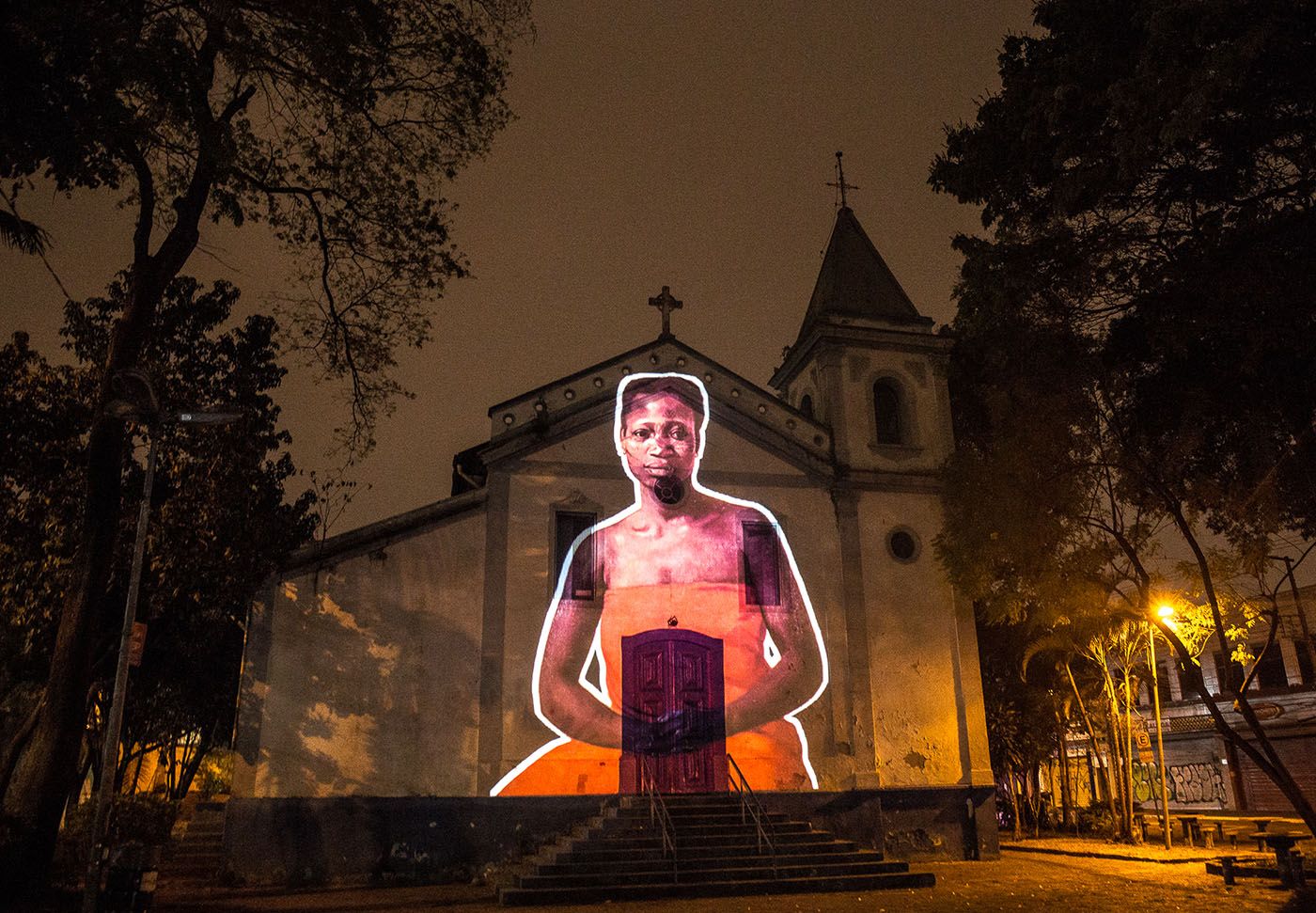 Coletivo Coletores. Voices Against Racism, 2020. Video projection of images of the quilombola leader Tereza de Benguela onto the Igreja dos Homens Pretos in Penha de França, São Paulo.