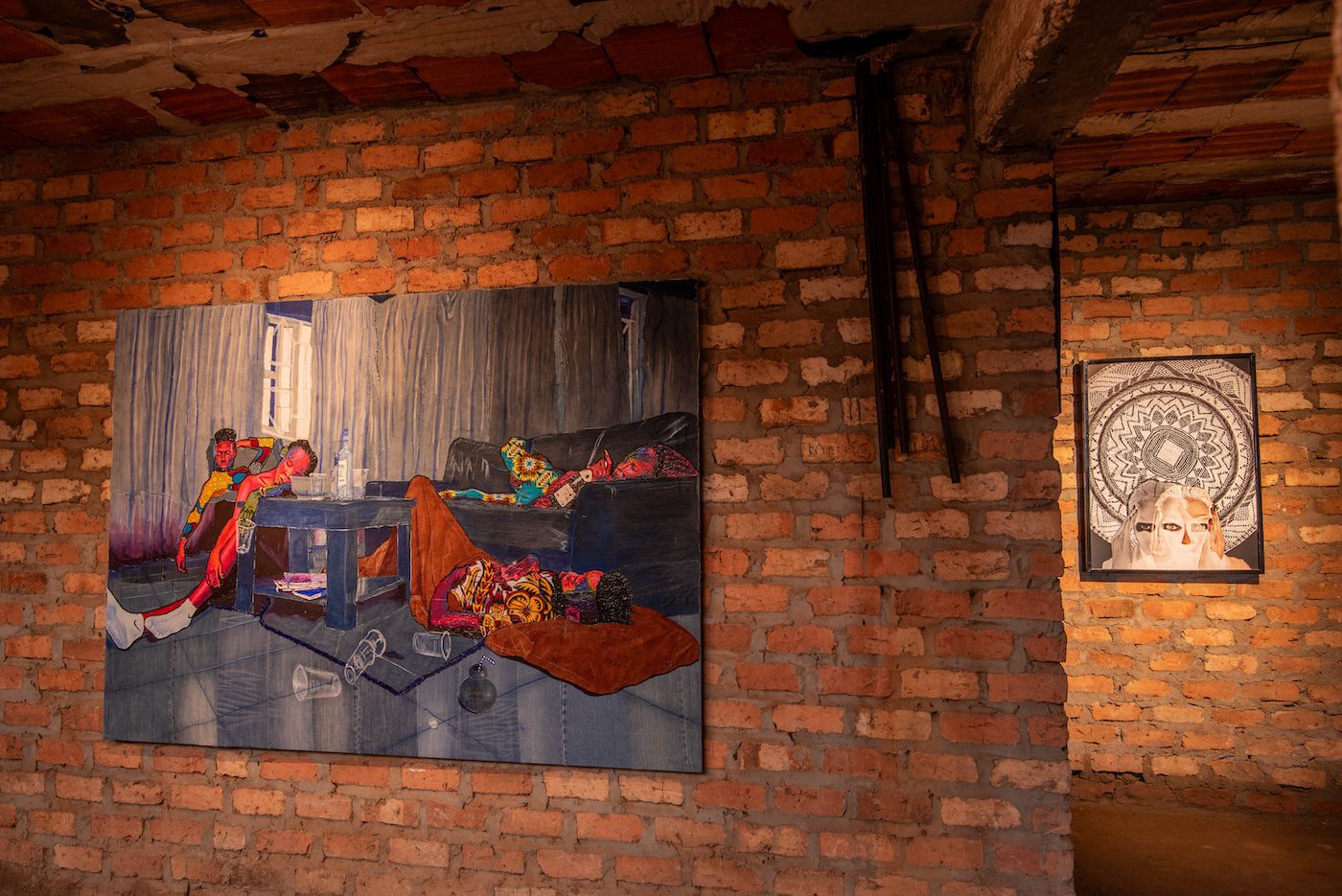 Matt Kayem, Slumber Party, 2022, Acrylics, oil pastels on denim and bark-cloth, 153 x 214 cm, Ethel Aanyu, Esikadikit, 2023, archival print on canvas, 98 x 71 cm at Silent Invasions: The Art of Material Hacking. Photo: Atiko Anthony