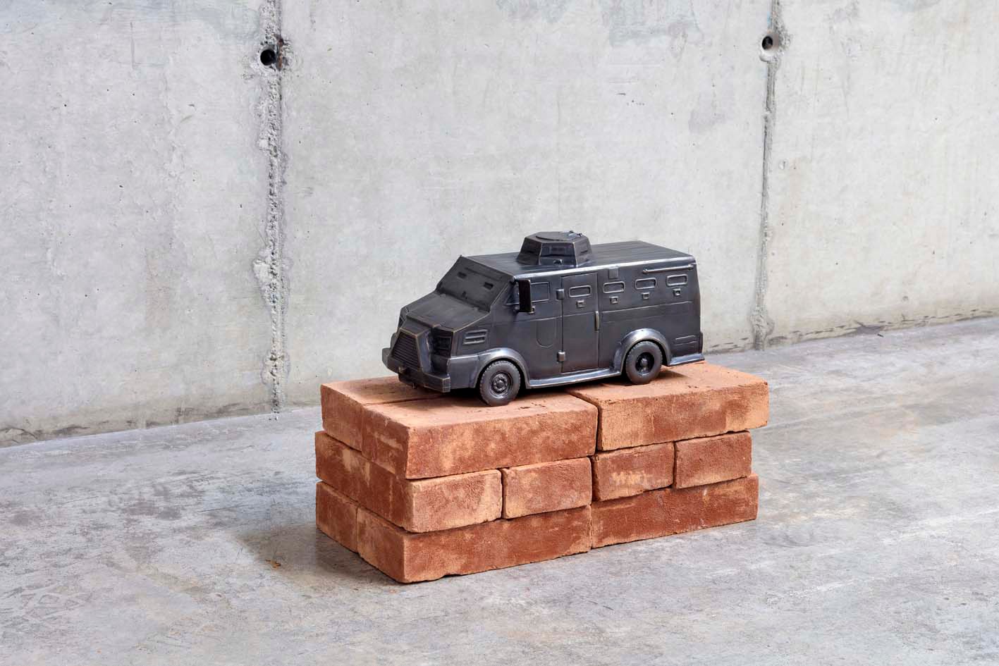 Jaime Lauriano, Brinquedo de furar moletom, (“Toy for Piercing Sweatshirts”, 2018) Armored police vehicle, sculptures, variable dimensions. Photo: Filipe Berndt