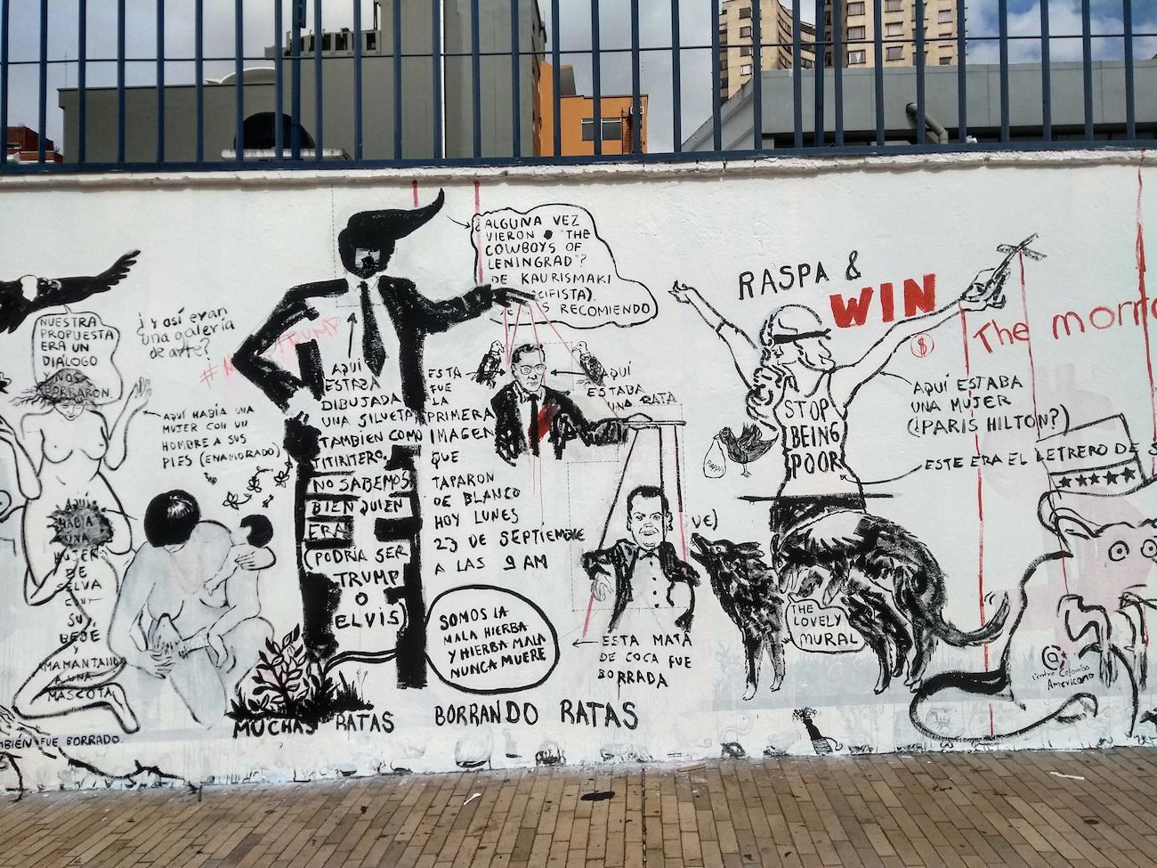 Powerpaola y Lucas Ospina, Mural, Centro Colombo Americano. Arquitecturas Narrativas. The piece was censored and painted white by the institution, and then re-painted by the artists and other people who joined the act against censorship.